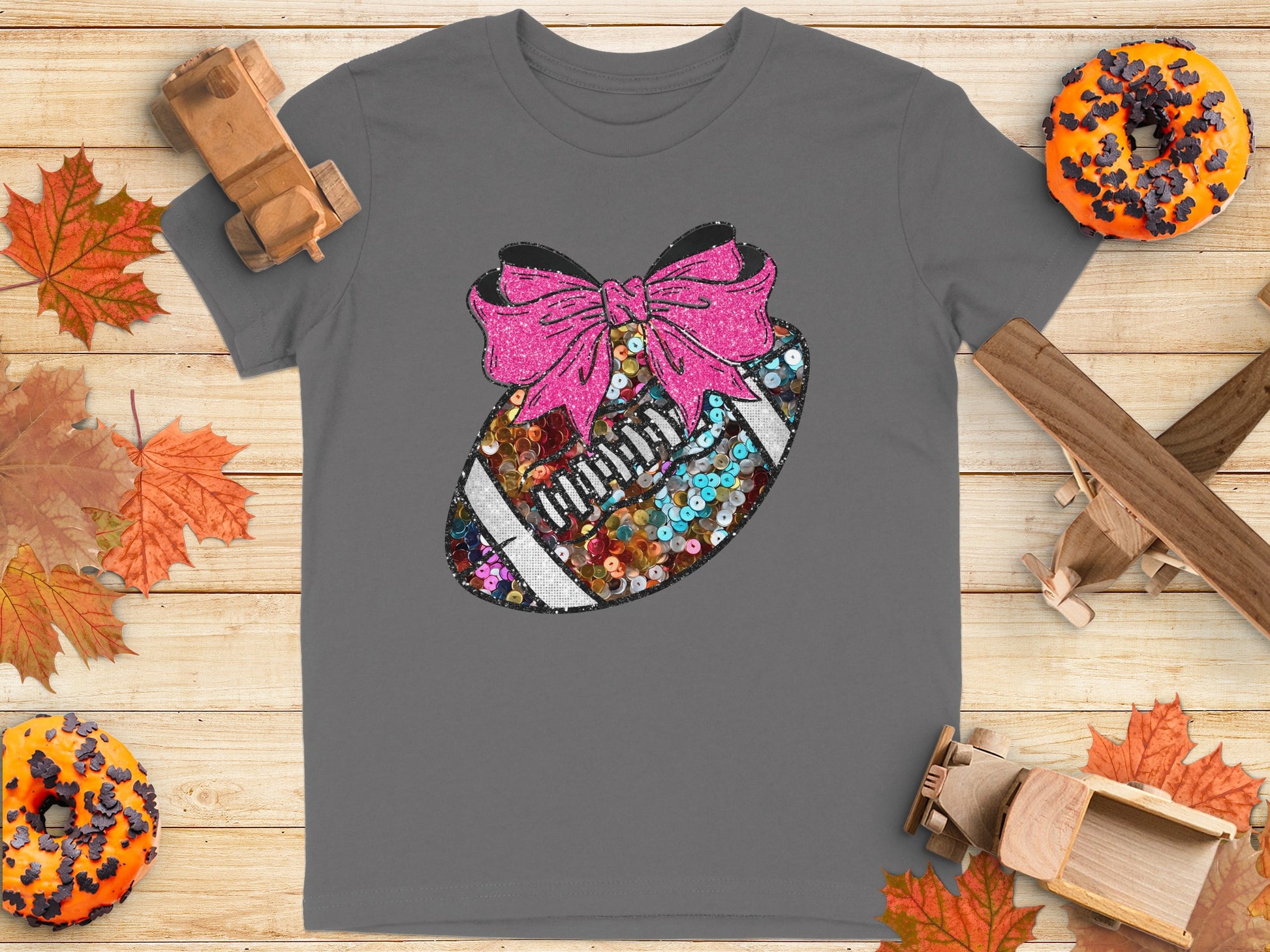 Colorful Sequined Football with Pink Bow T-shirt product type