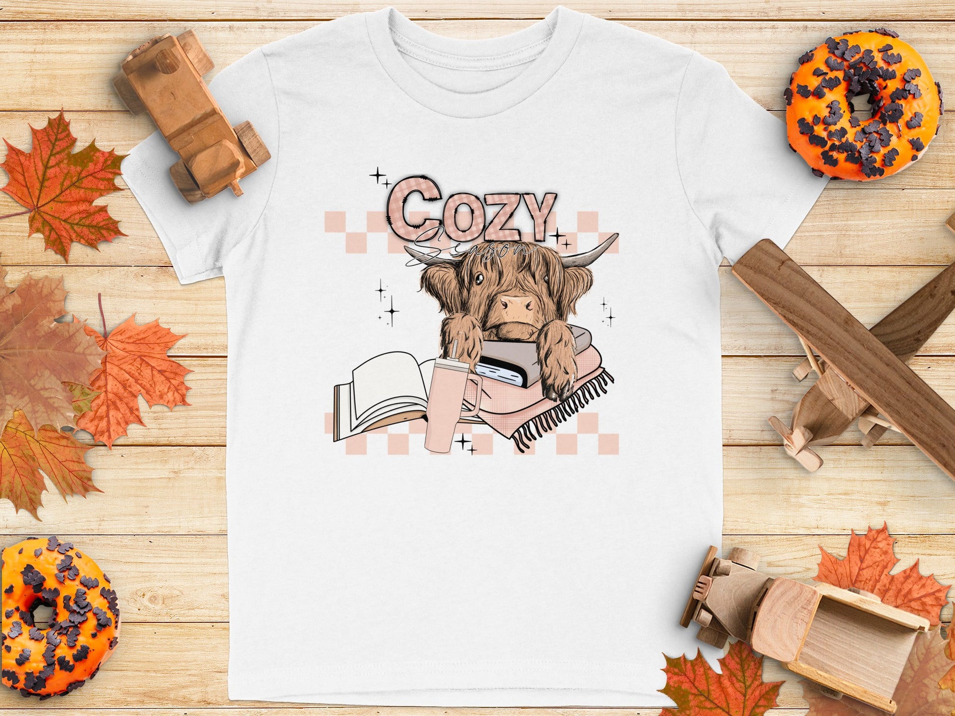 Cozy Highland Cow with Book and Tea T-shirt product type